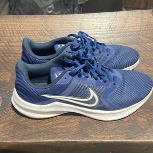 Nike Downshifter 12 sneakers.